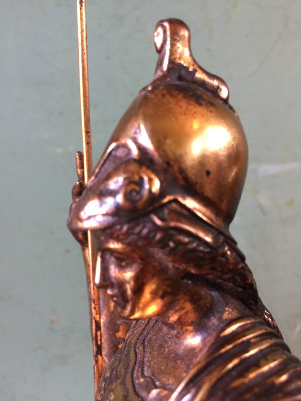 A nineteenth-century gilded bronze sculpture depicting the classical goddess Athena holding a spear, standing on a dark marble base. View X