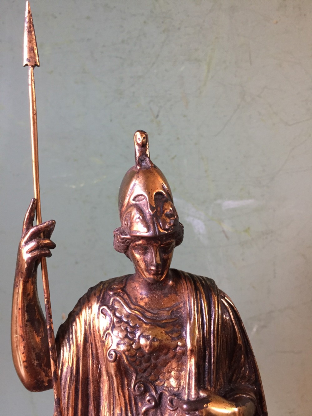 A nineteenth-century gilded bronze sculpture depicting the classical goddess Athena holding a spear, standing on a dark marble base. View XII