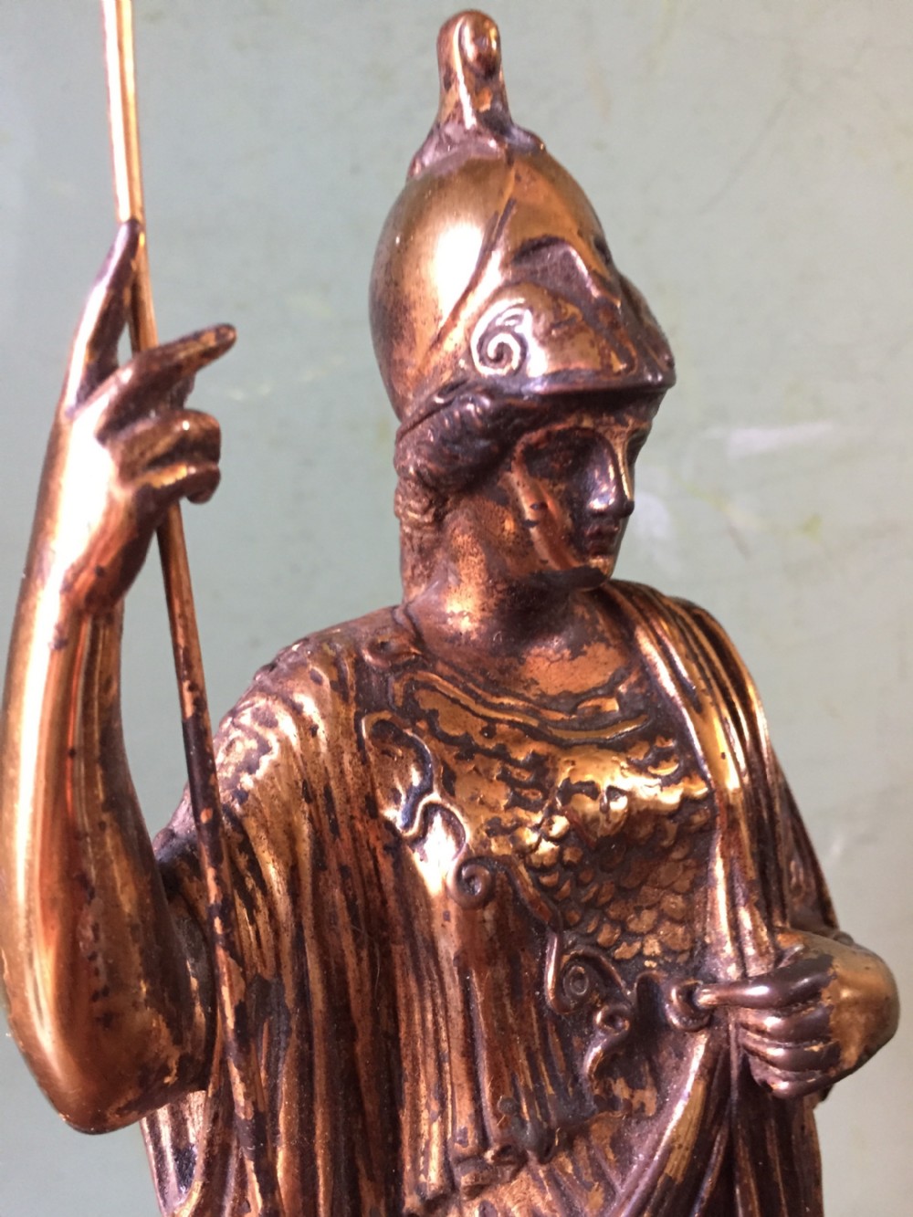 A nineteenth-century gilded bronze sculpture depicting the classical goddess Athena holding a spear, standing on a dark marble base. View XV
