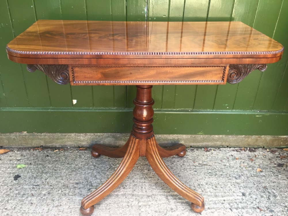 Elegant early C19th Regency period mahogany fold-over card or games table.