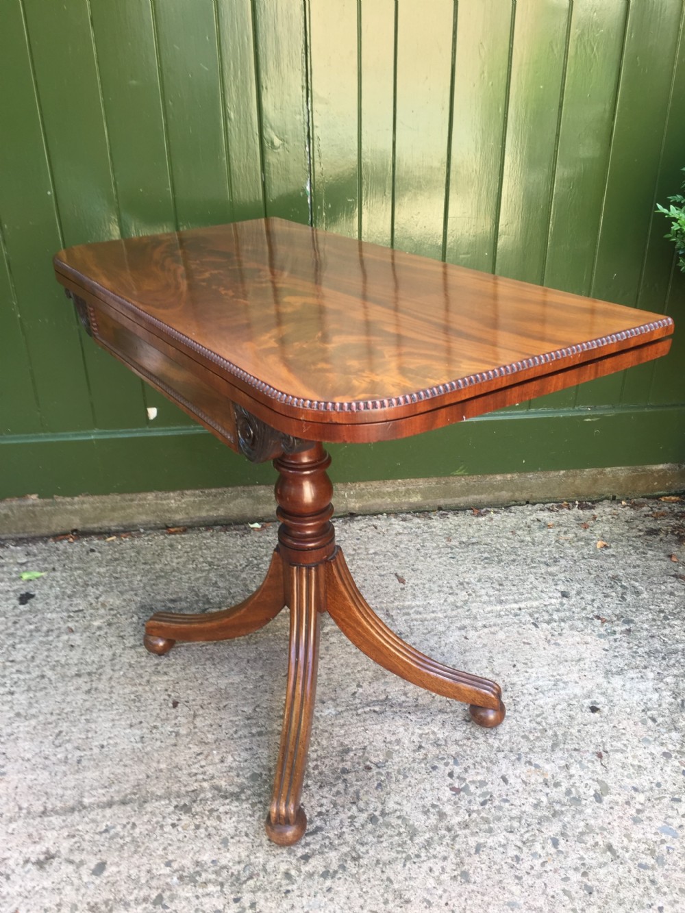Elegant early C19th Regency period mahogany fold-over card or games table. View IV