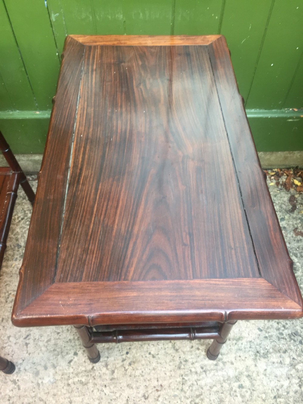 Pair of early C20th Chinese carved hardwood 2-tier end or occasional tables . View IV