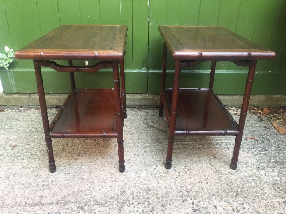 Pair of early C20th Chinese carved hardwood 2-tier end or occasional tables . View V
