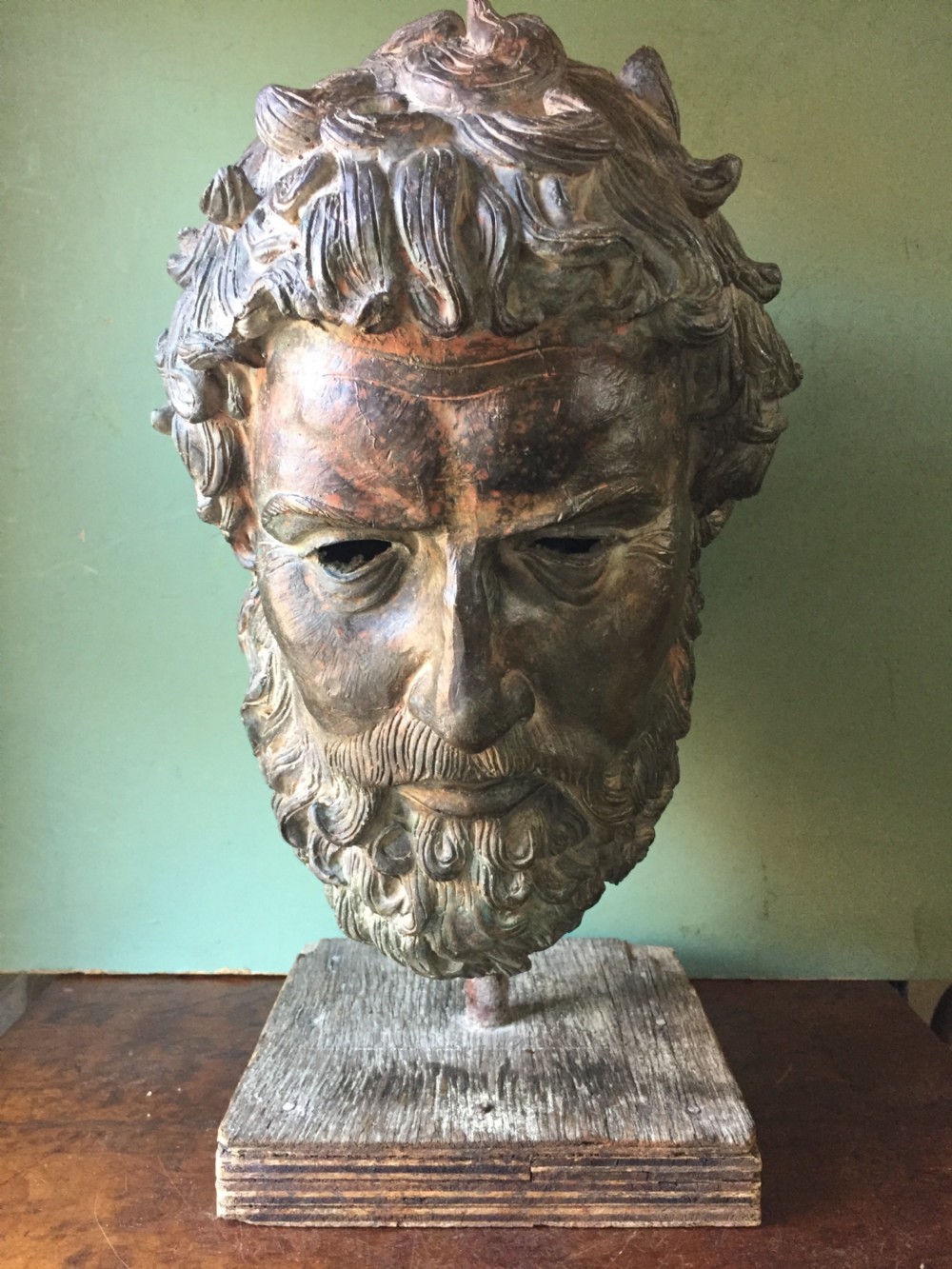 Early C20th verdigris bronze bust or head study of a Greek God or Spartan .