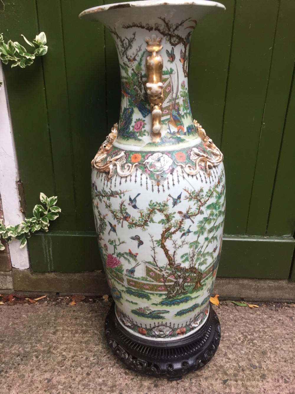 Large scale C19th Chinese Cantonese porcelain enamel decorated vase on hardwood stand in repaired 'country house' condition . View VII
