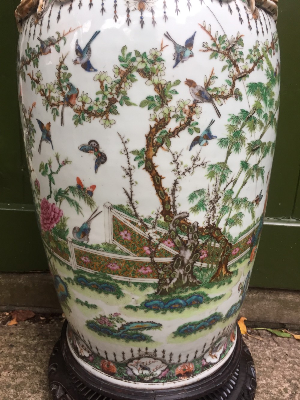 Large scale C19th Chinese Cantonese porcelain enamel decorated vase on hardwood stand in repaired 'country house' condition . View VIII