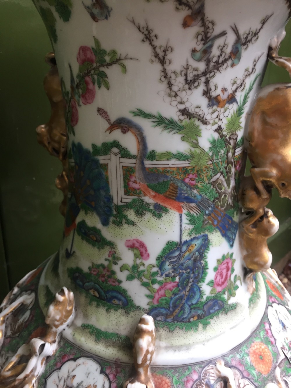 Large scale C19th Chinese Cantonese porcelain enamel decorated vase on hardwood stand in repaired 'country house' condition . View XV