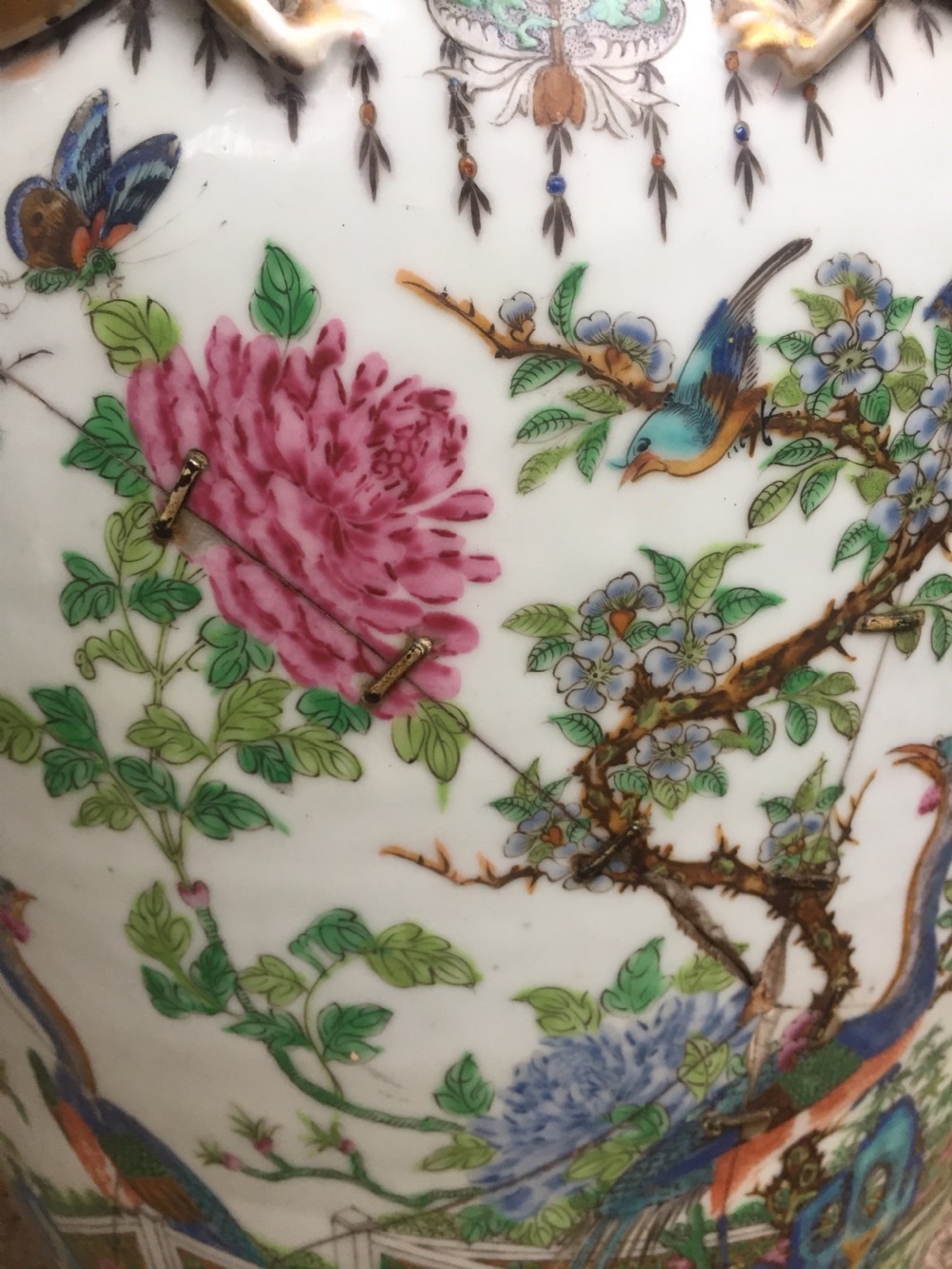 Large scale C19th Chinese Cantonese porcelain enamel decorated vase on hardwood stand in repaired 'country house' condition . View XVI
