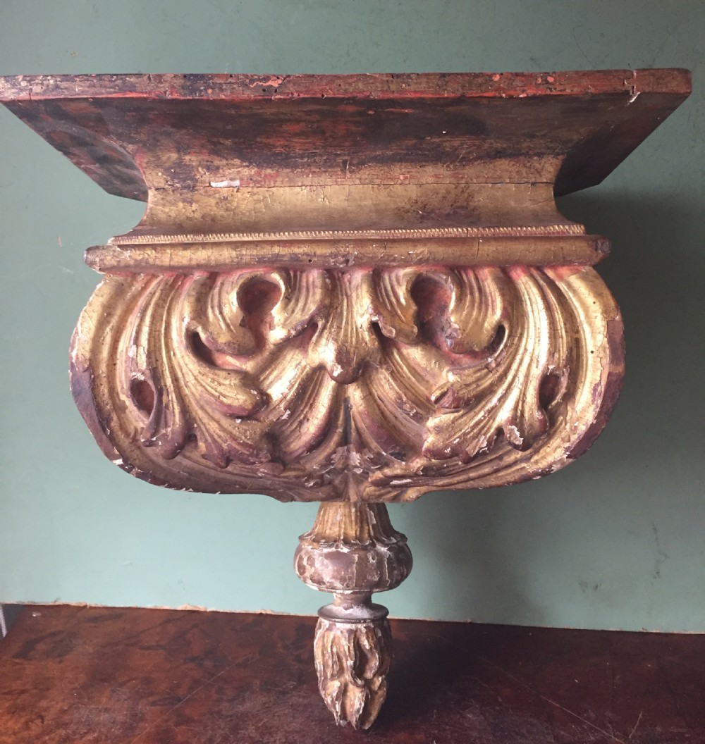 Early C18th Italian carved giltwood display bracket .
