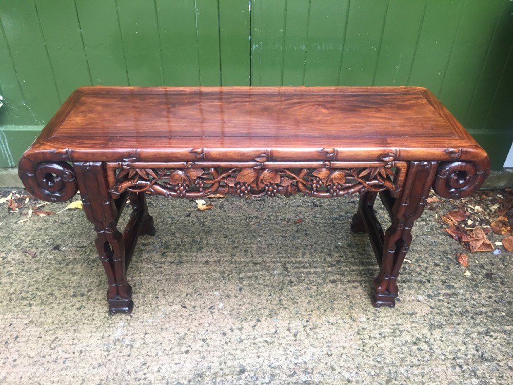Superior quality late C19th Chinese Qing Dynasty carved hardwood 'kang' table in the form of a miniature altar table . View III