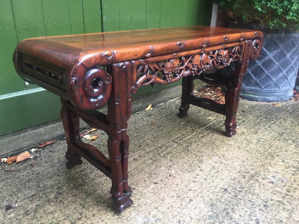 Superior quality late C19th Chinese Qing Dynasty carved hardwood 'kang' table in the form of a miniature altar table . View IV