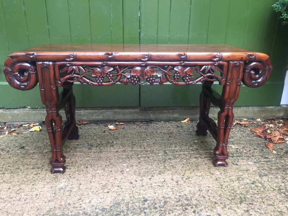 Superior quality late C19th Chinese Qing Dynasty carved hardwood 'kang' table in the form of a miniature altar table . View XII