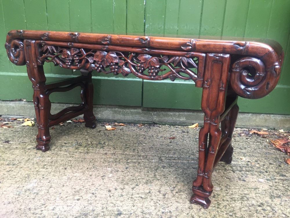 Superior quality late C19th Chinese Qing Dynasty carved hardwood 'kang' table in the form of a miniature altar table . View XIII
