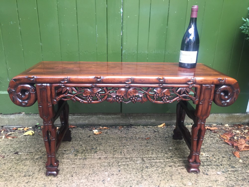 Superior quality late C19th Chinese Qing Dynasty carved hardwood 'kang' table in the form of a miniature altar table . View XIV