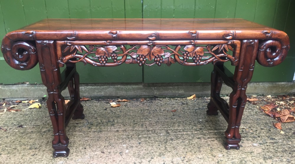 Superior quality late C19th Chinese Qing Dynasty carved hardwood 'kang' table in the form of a miniature altar table . View XV