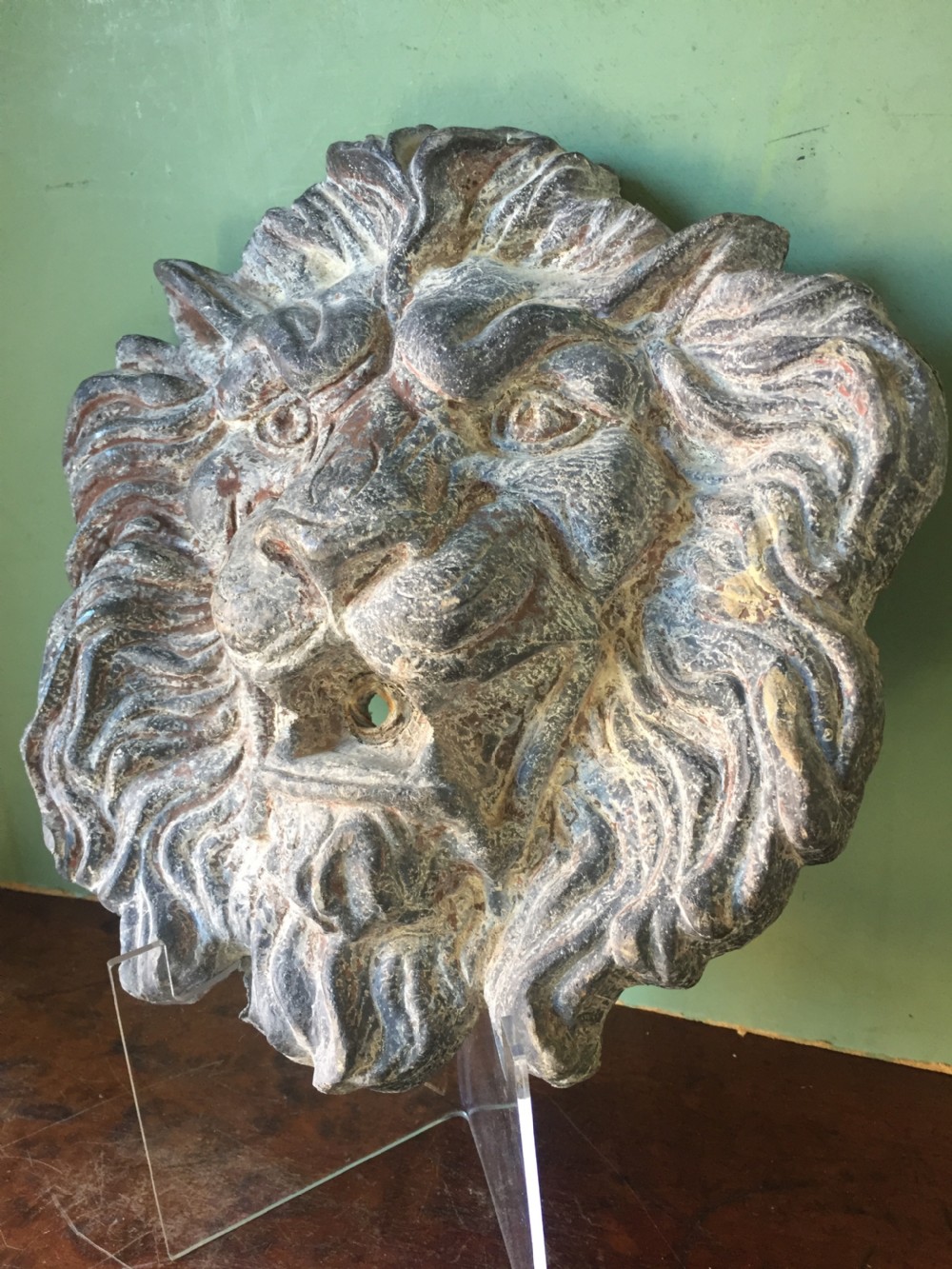 Well cast and patinated mid C19th lead lion's-mask wall-fountain head . View III