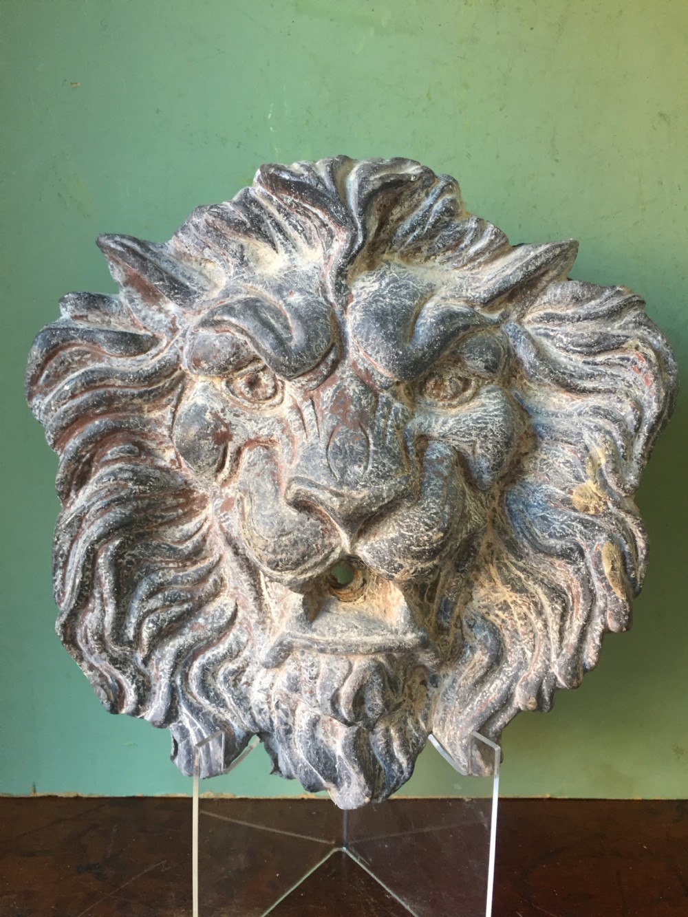 Well cast and patinated mid C19th lead lion's-mask wall-fountain head . View V
