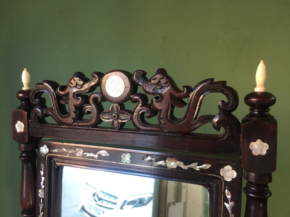 Interesting mid C19th Chinese miniature hardwood-framed vanity mirror with 'mother of pearl' inlay and ivory finials. View V