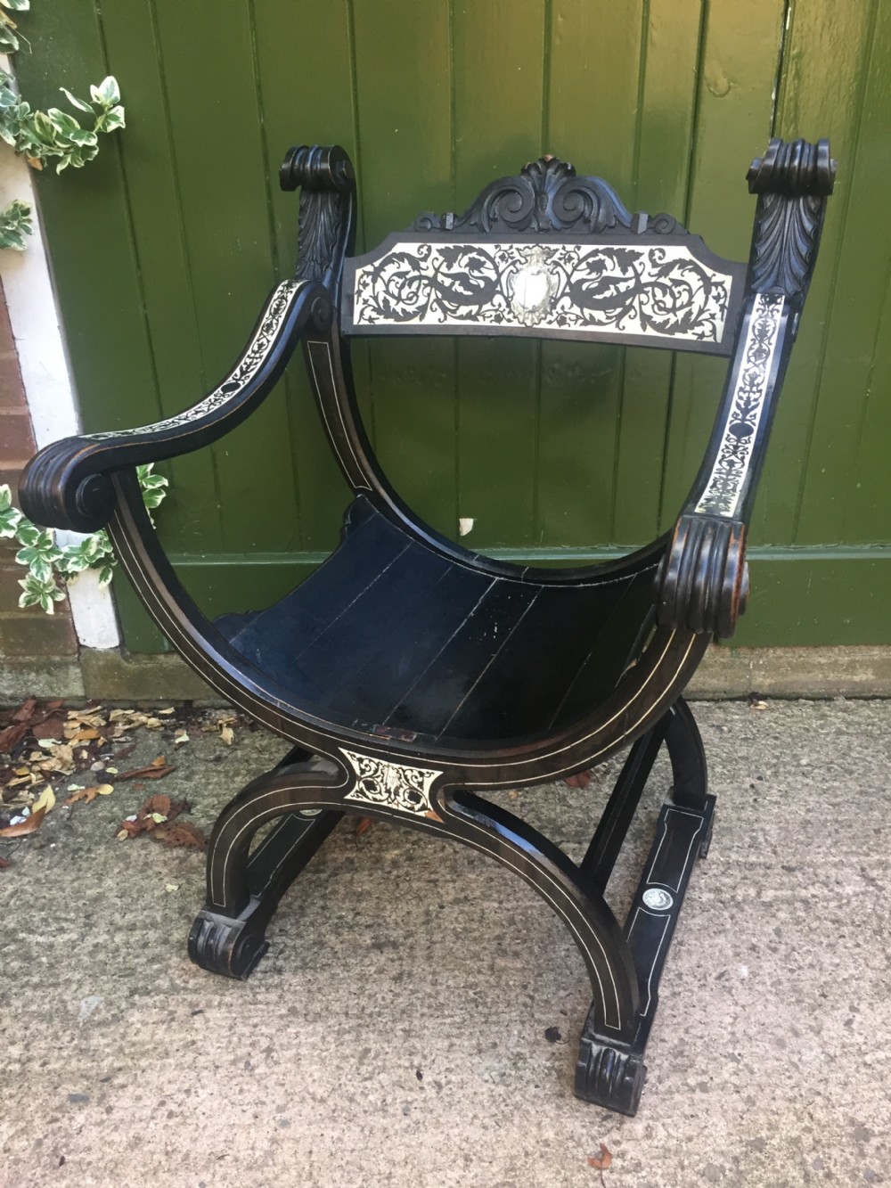 C19th Italian ebonised and ivory inlaid 'Savonarola' type armchair of Renaissance style. View II