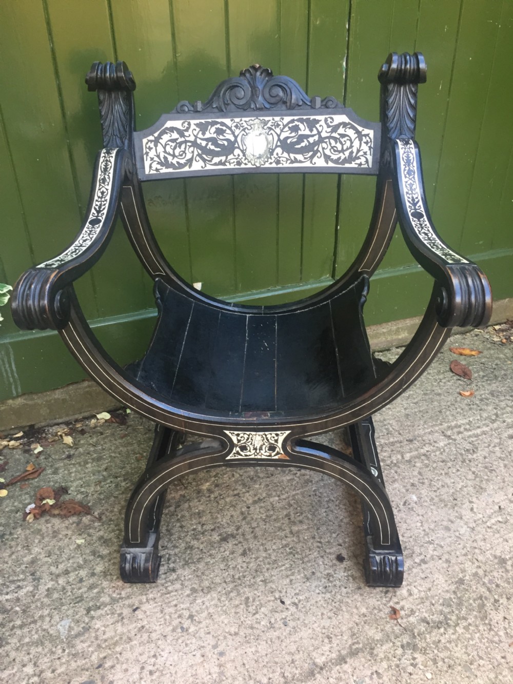 C19th Italian ebonised and ivory inlaid 'Savonarola' type armchair of Renaissance style. View III