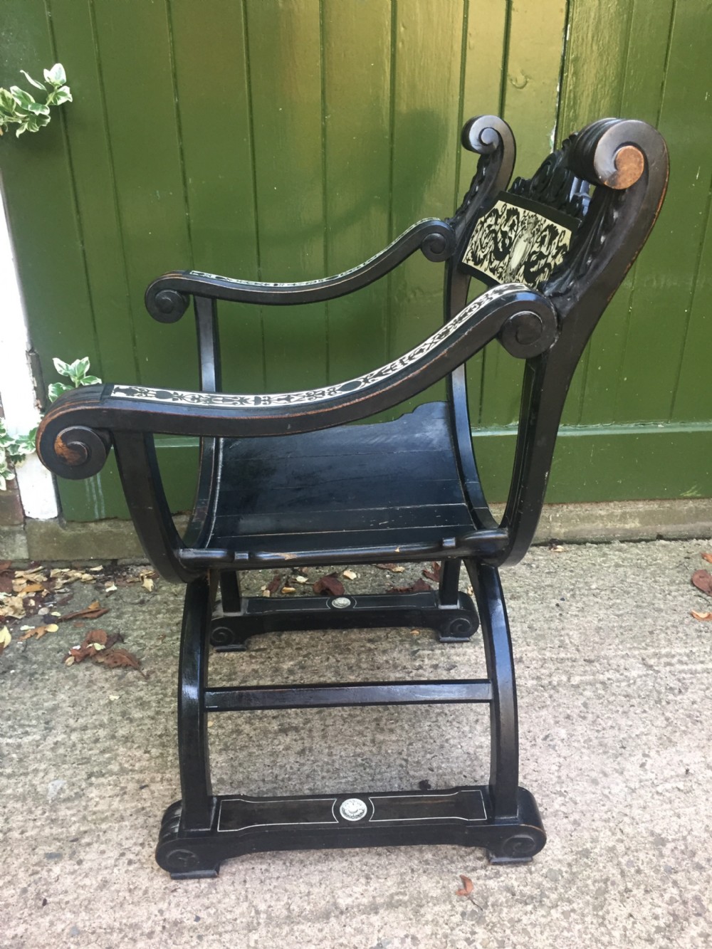 C19th Italian ebonised and ivory inlaid 'Savonarola' type armchair of Renaissance style. View VI