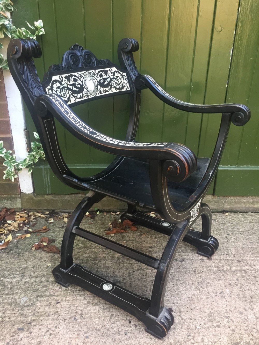 C19th Italian ebonised and ivory inlaid 'Savonarola' type armchair of Renaissance style. View IX