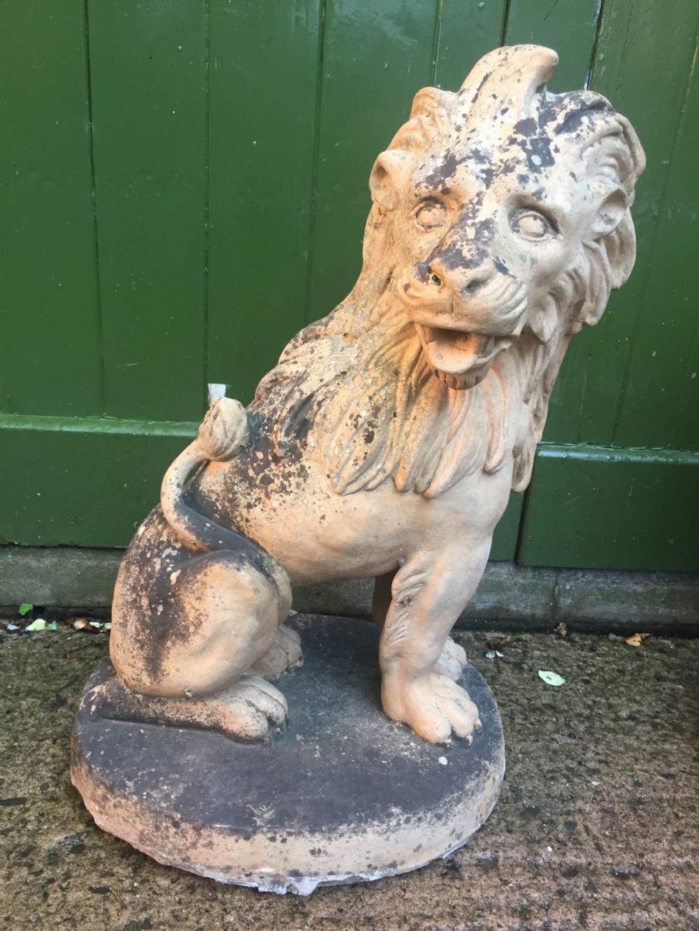 Fine and decorative pair of C19th weathered terracotta sitting lions in the C18th anthropomorphic taste. View V
