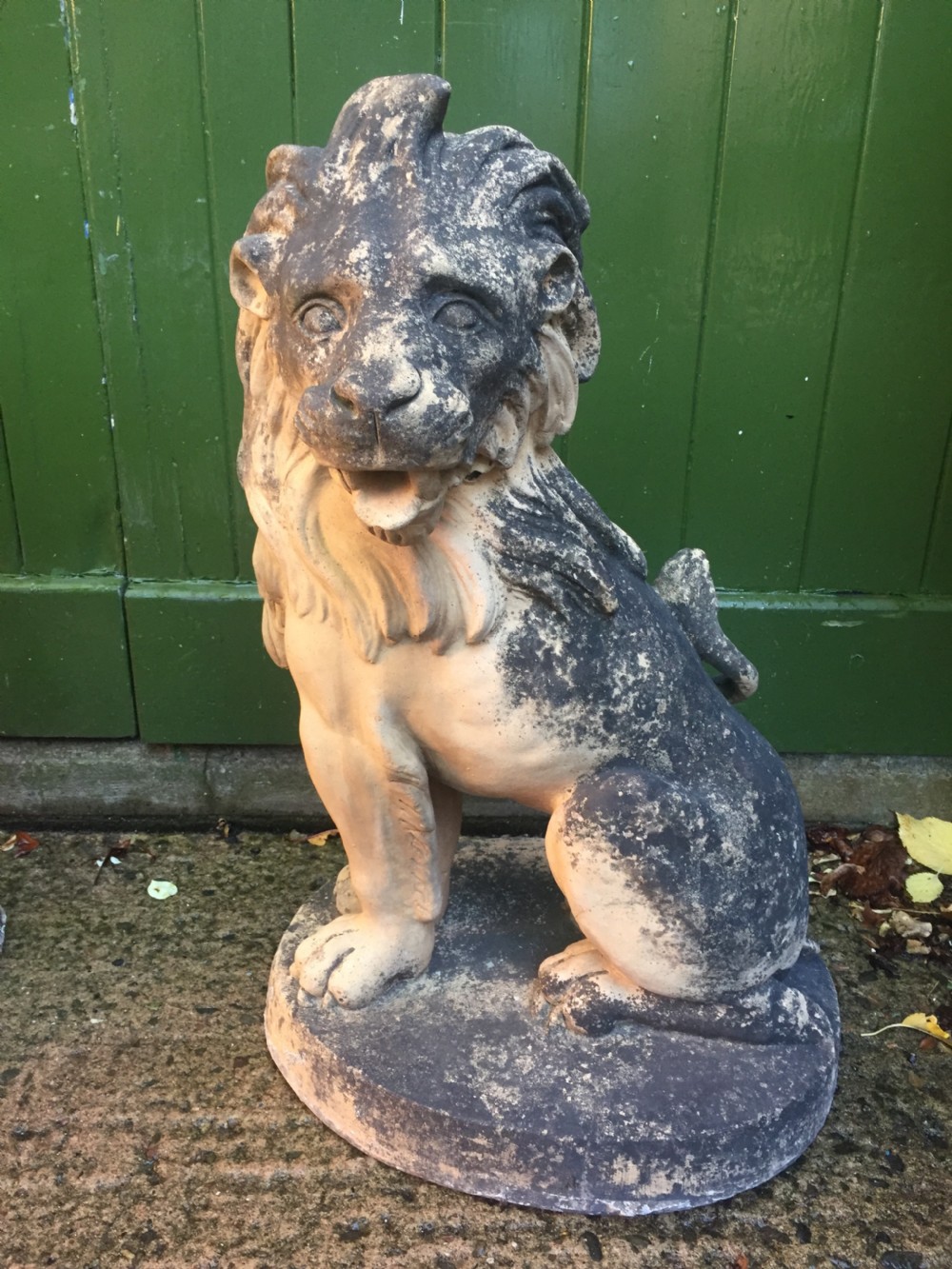 Fine and decorative pair of C19th weathered terracotta sitting lions in the C18th anthropomorphic taste. View VI
