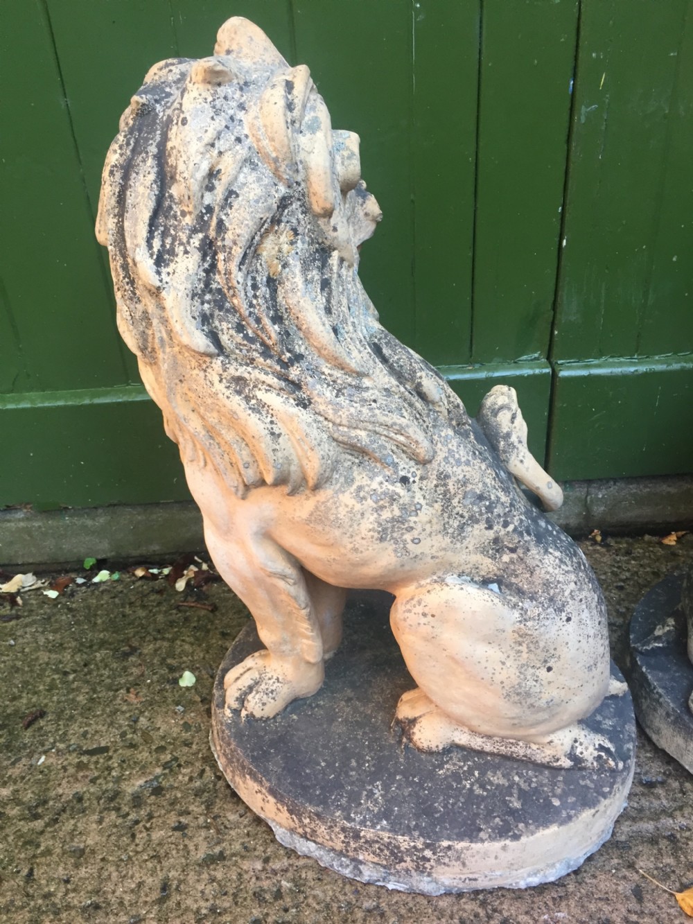 Fine and decorative pair of C19th weathered terracotta sitting lions in the C18th anthropomorphic taste. View IX