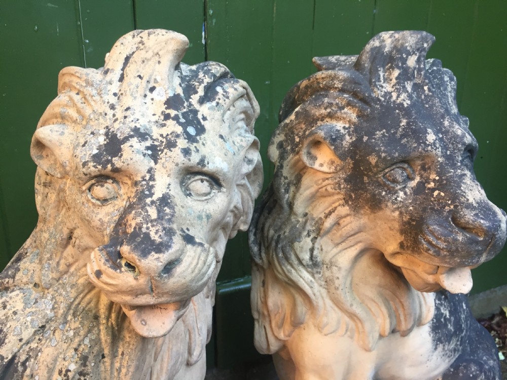 Fine and decorative pair of C19th weathered terracotta sitting lions in the C18th anthropomorphic taste. View XIII