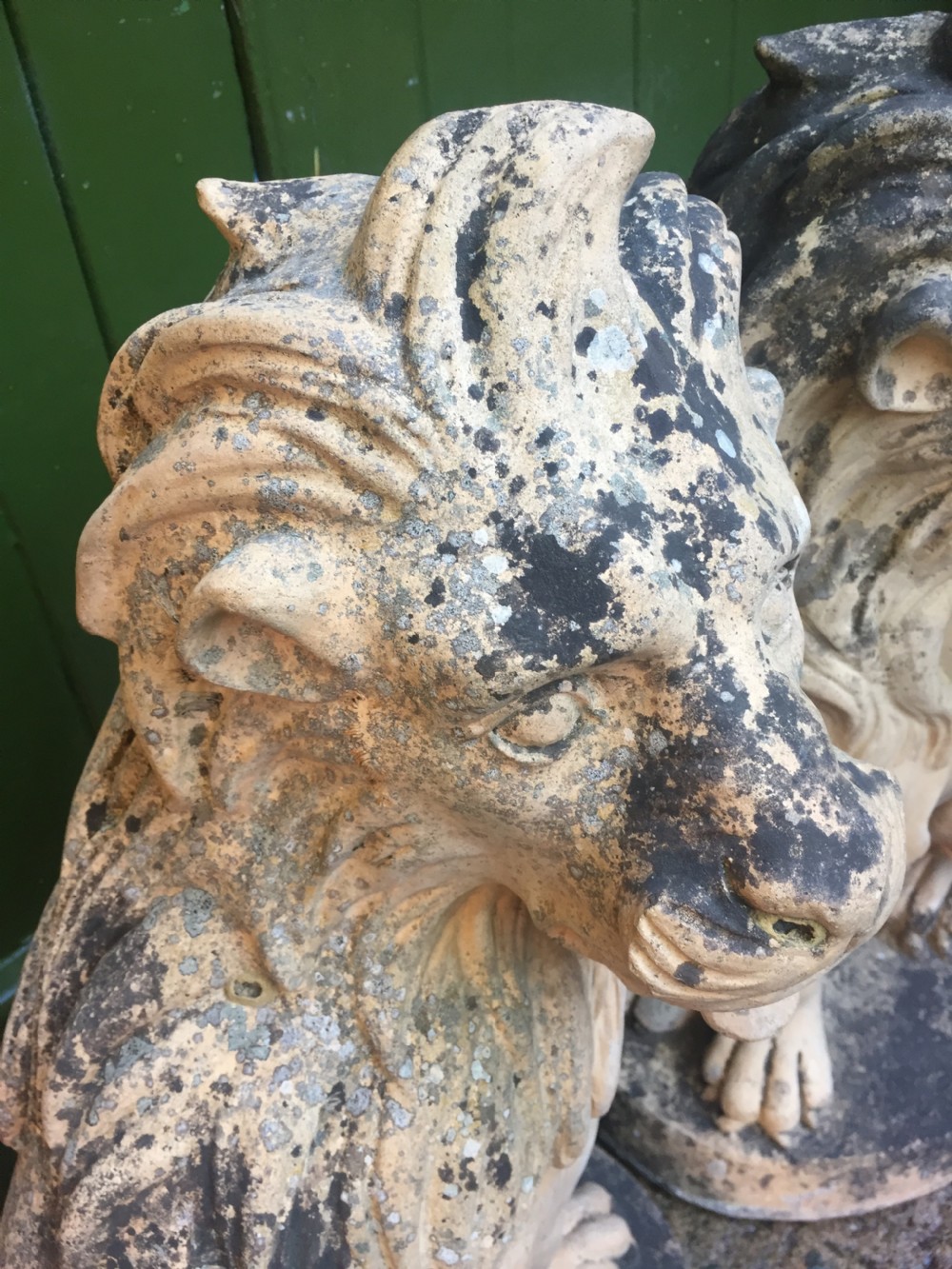 Fine and decorative pair of C19th weathered terracotta sitting lions in the C18th anthropomorphic taste. View XIV