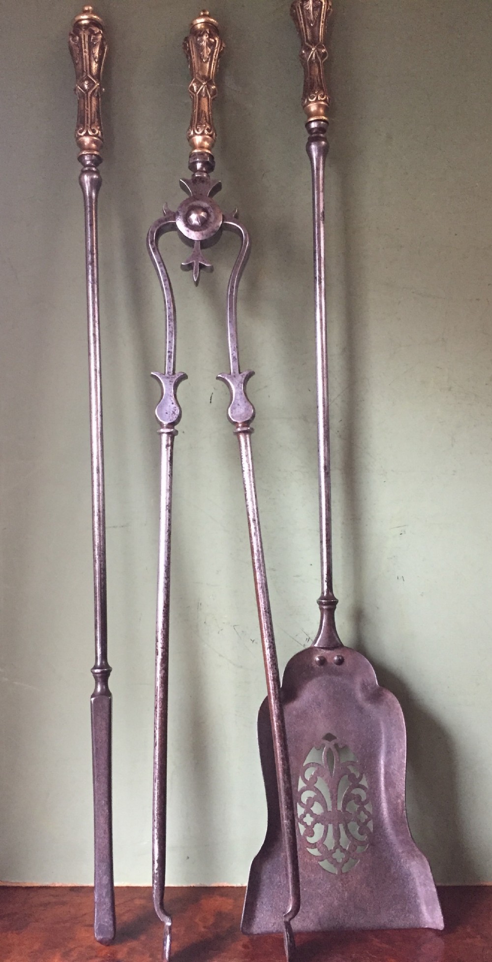 Good set of 3 early C19th George IV period brass-handled steel fire-irons .