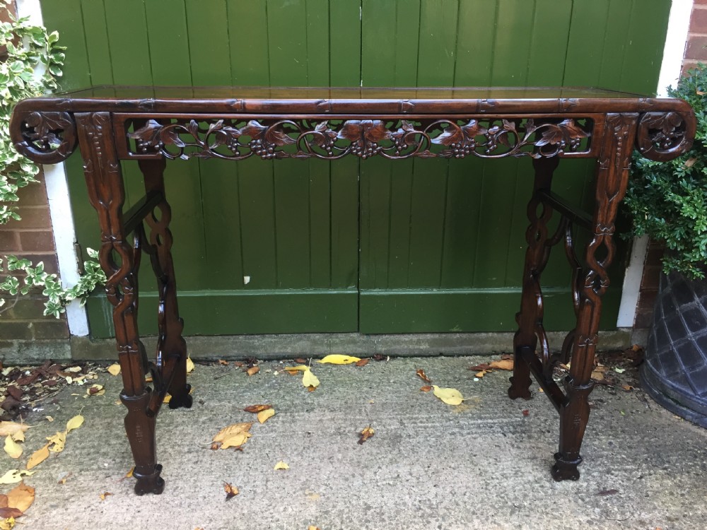 Fine quality late C19th Chinese Qing Dynasty carved hardwood scroll-ended 'altar' or console table of elegant proportions.
