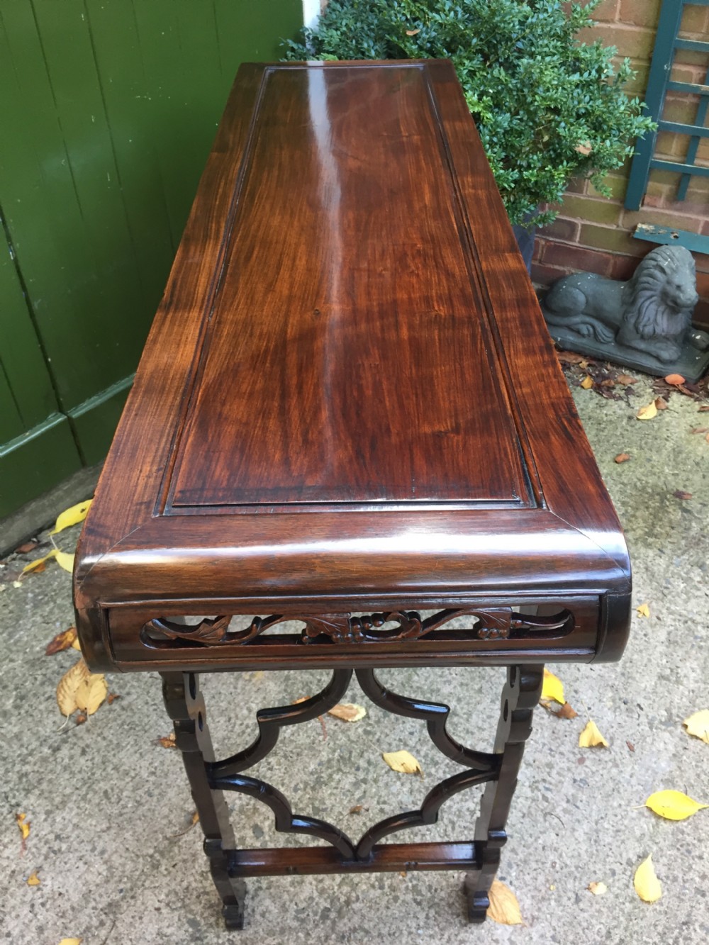 Fine quality late C19th Chinese Qing Dynasty carved hardwood scroll-ended 'altar' or console table of elegant proportions. View VI