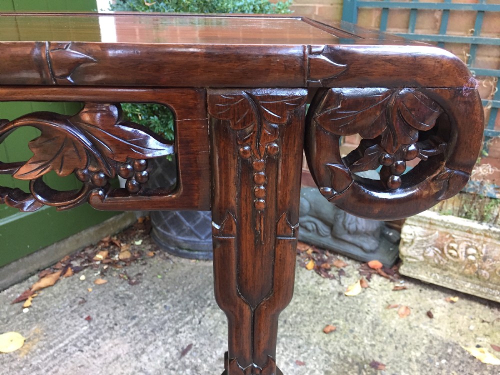 Fine quality late C19th Chinese Qing Dynasty carved hardwood scroll-ended 'altar' or console table of elegant proportions. View VIII