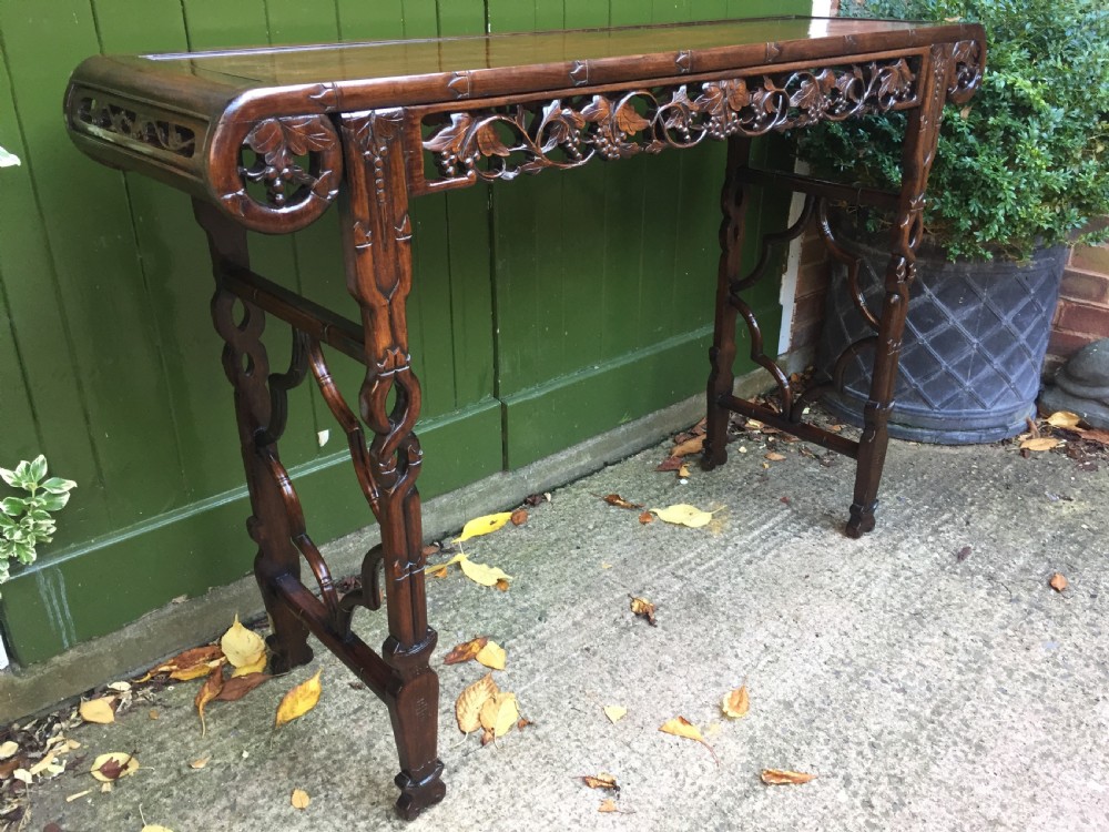 Fine quality late C19th Chinese Qing Dynasty carved hardwood scroll-ended 'altar' or console table of elegant proportions. View XIII