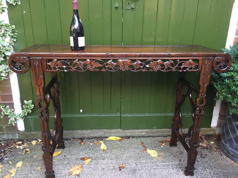 Fine quality late C19th Chinese Qing Dynasty carved hardwood scroll-ended 'altar' or console table of elegant proportions. View XVIII