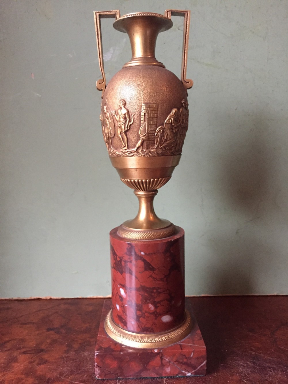 Fine quality early C19th French neo-classical gilt-bronze urn on a 'rouge griotte' marble base.