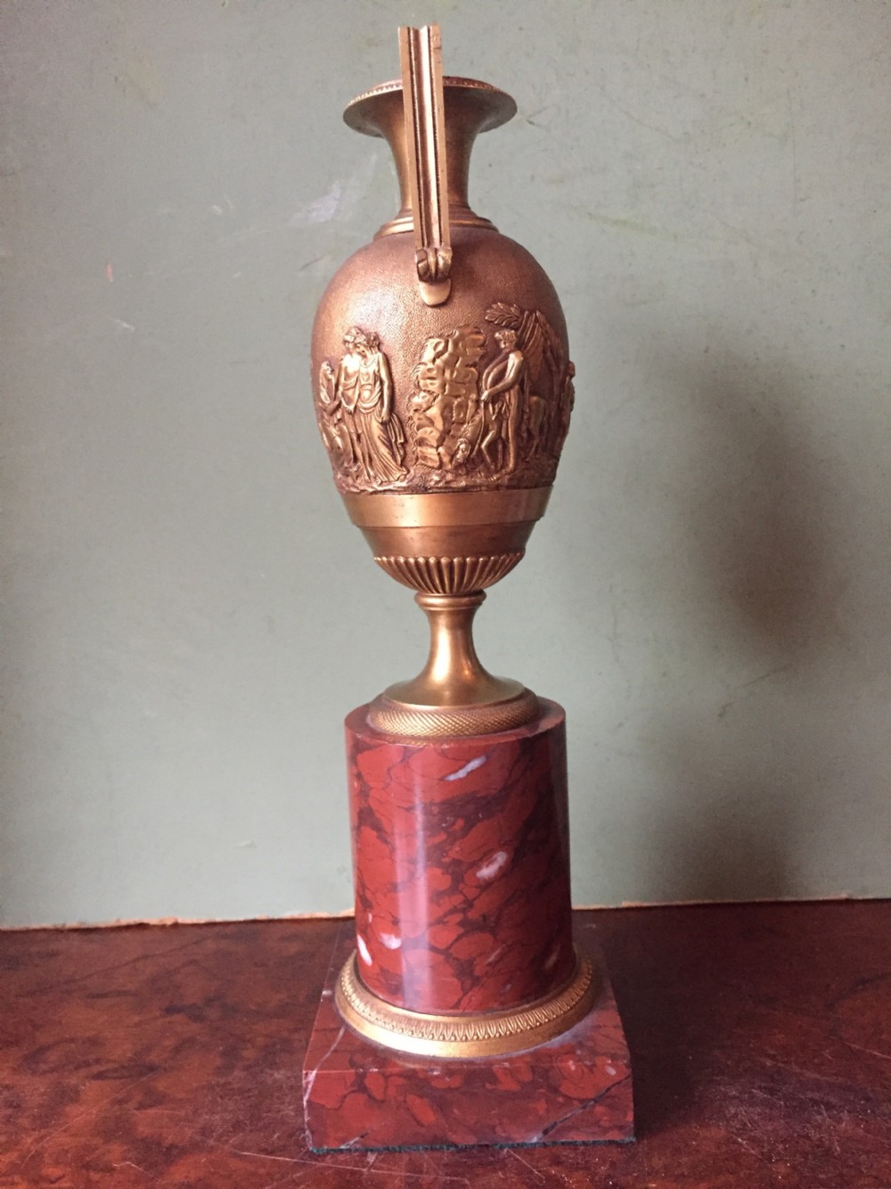 Fine quality early C19th French neo-classical gilt-bronze urn on a 'rouge griotte' marble base. View IV