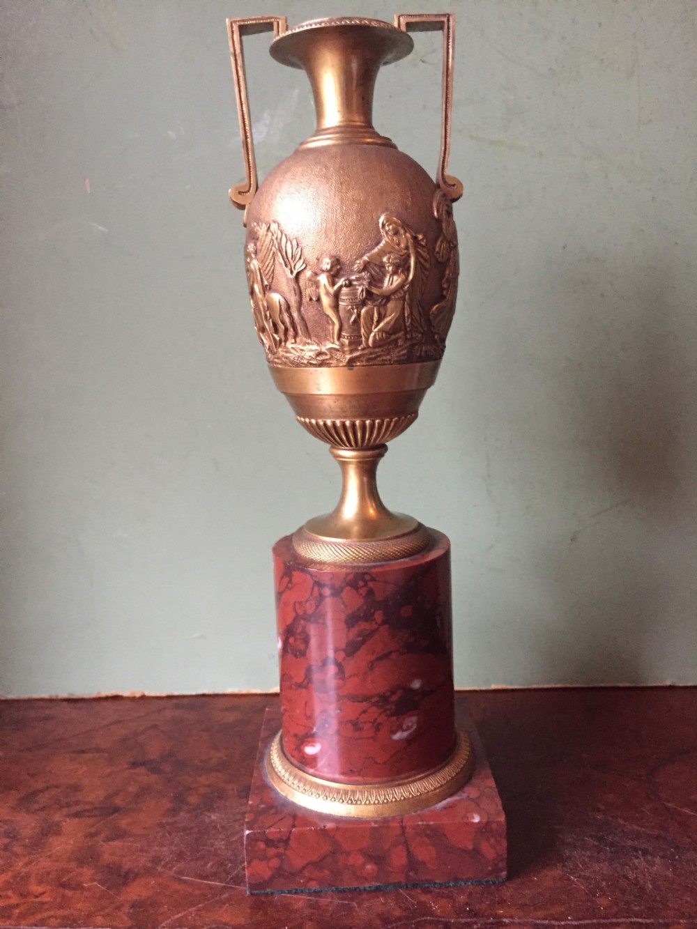 Fine quality early C19th French neo-classical gilt-bronze urn on a 'rouge griotte' marble base. View VI
