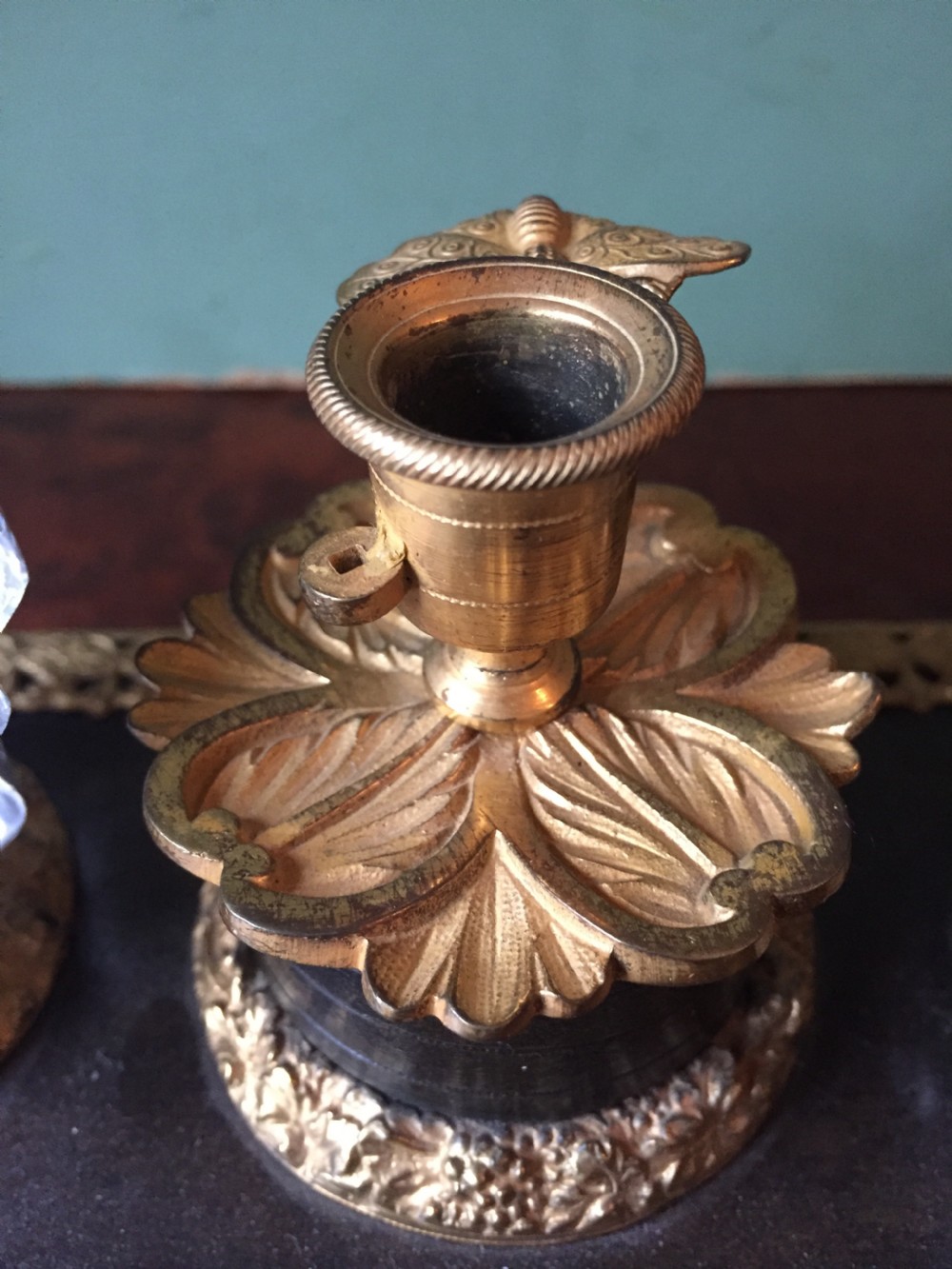 An early nineteenth-century French Empire style ormolu inkstand featuring two cut-crystal inkwells, a central holder, foliate handles, and a decorative gilt bronze tray. View VI