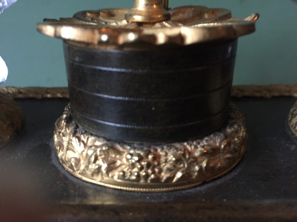 An early nineteenth-century French Empire style ormolu inkstand featuring two cut-crystal inkwells, a central holder, foliate handles, and a decorative gilt bronze tray. View XI