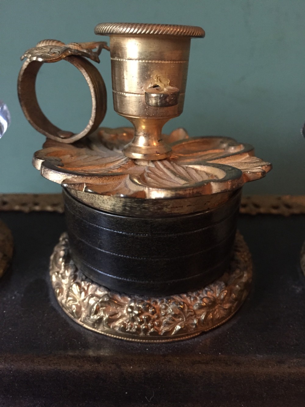 An early nineteenth-century French Empire style ormolu inkstand featuring two cut-crystal inkwells, a central holder, foliate handles, and a decorative gilt bronze tray. View XXI