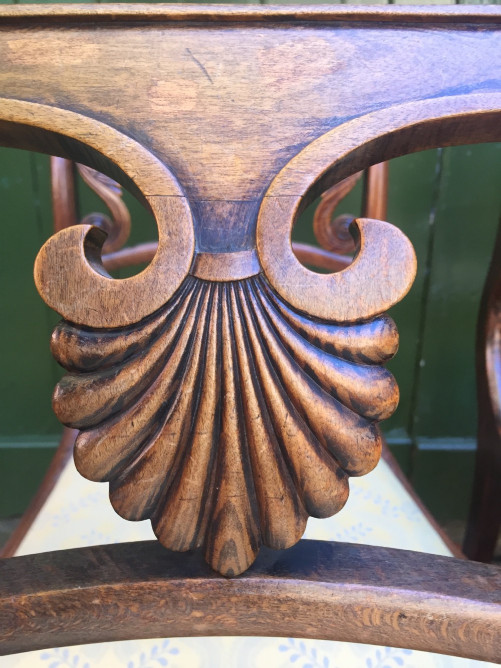 A set of four early nineteenth-century Regency Greek Revival side chairs with carved anthemion backrests and yellow upholstered seats. View VI