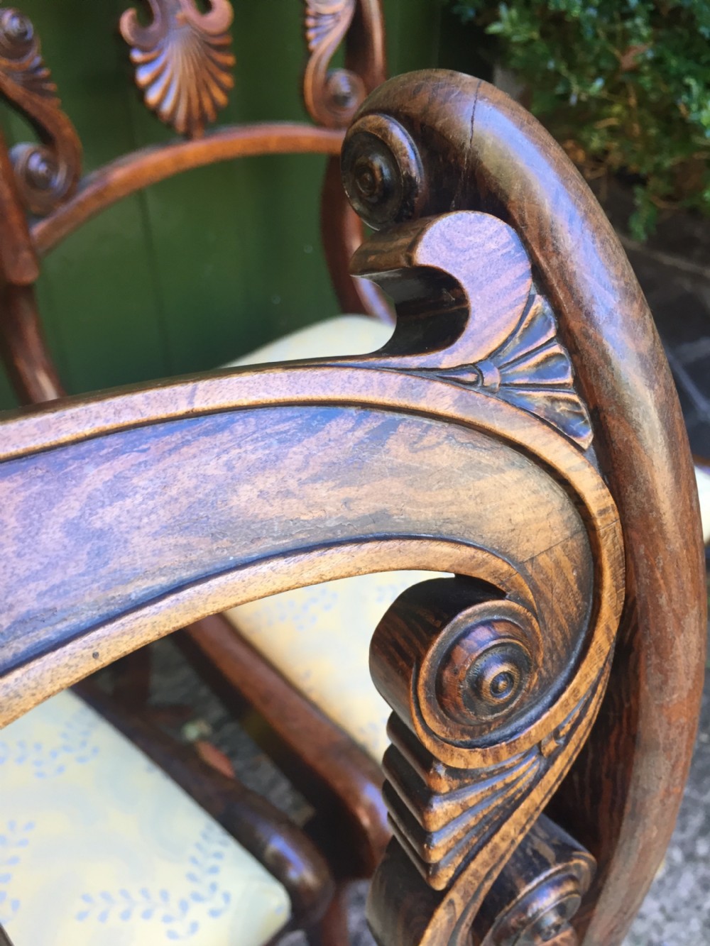 A set of four early nineteenth-century Regency Greek Revival side chairs with carved anthemion backrests and yellow upholstered seats. View XVII