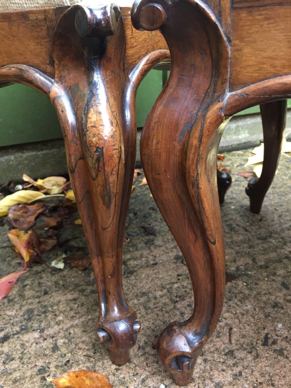Pair of mid C19th Victorian period carved and figured rosewood-framed stools with needlework seats. View V