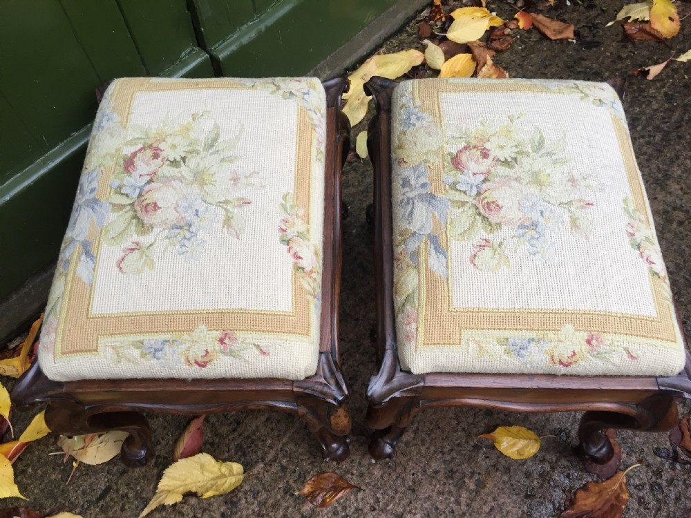 Pair of mid C19th Victorian period carved and figured rosewood-framed stools with needlework seats. View VII