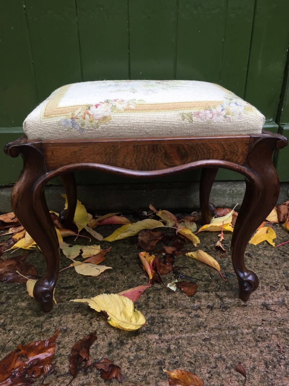 Pair of mid C19th Victorian period carved and figured rosewood-framed stools with needlework seats. View IX