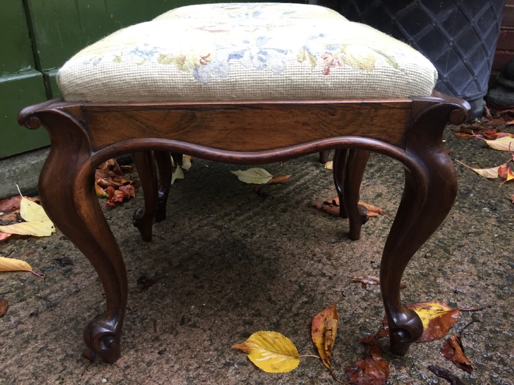 Pair of mid C19th Victorian period carved and figured rosewood-framed stools with needlework seats. View XI