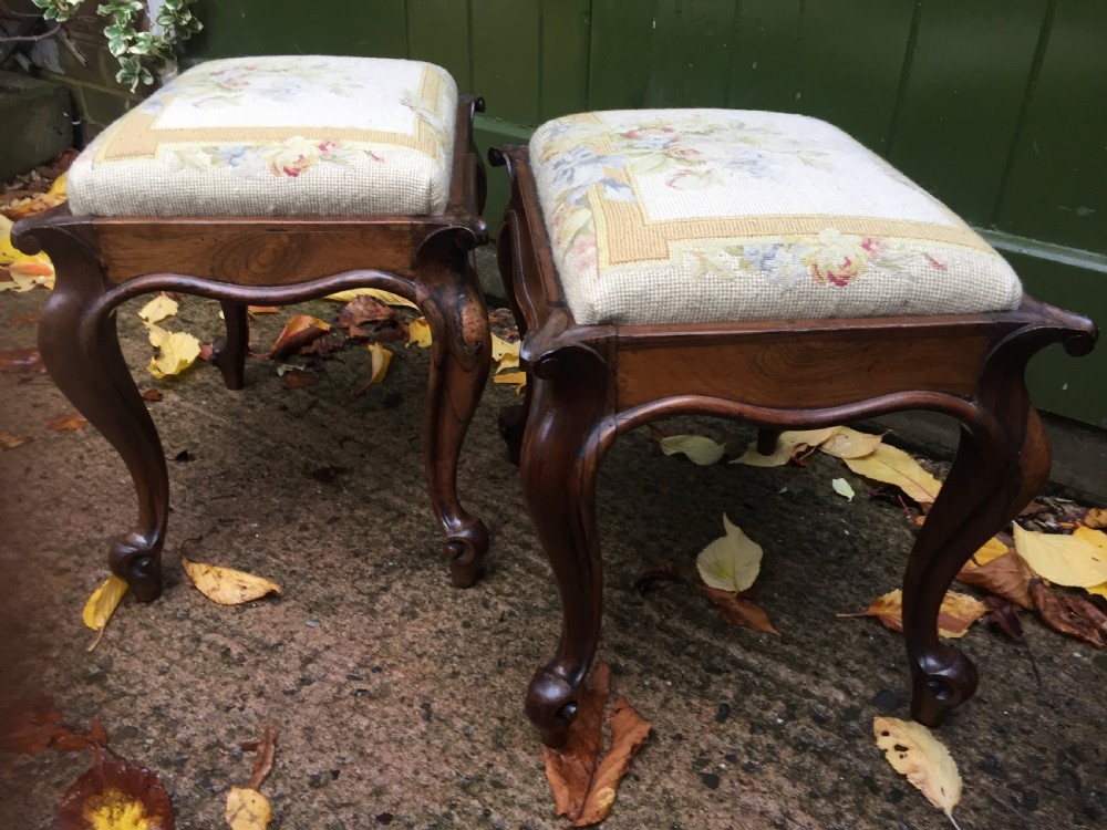 Pair of mid C19th Victorian period carved and figured rosewood-framed stools with needlework seats. View XIII